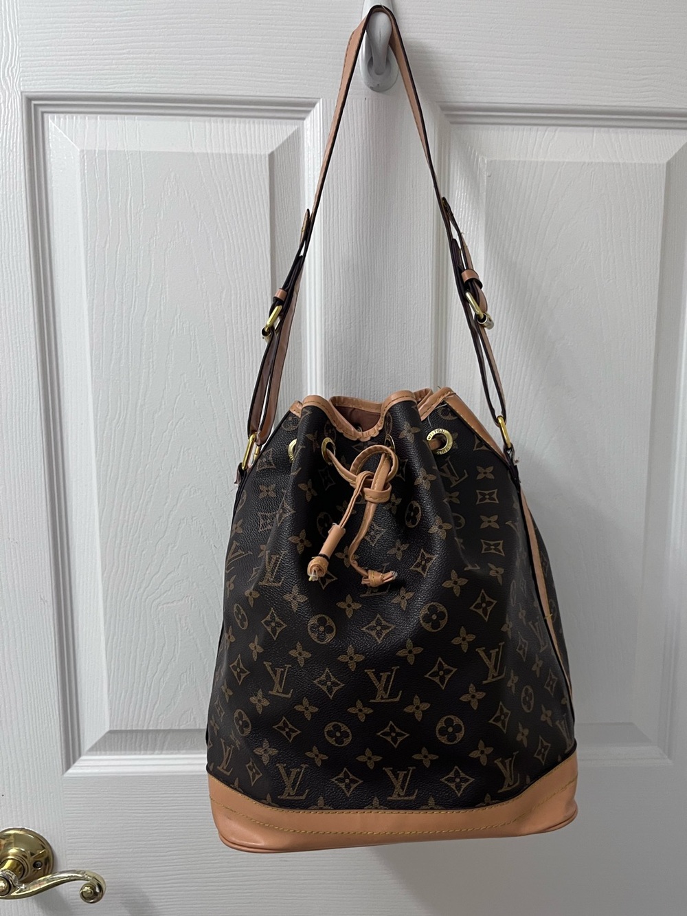 Very nice brown & tan Monogram Drawstring Bucket Bag in Brown and Tan❤️